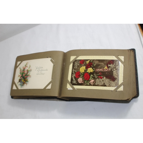 725 - VICTORIAN POSTCARD ALBUM