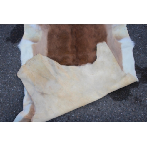 154 - ANIMAL HIDE RUG
147 X 80CM