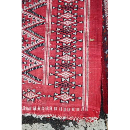 155 - THREE EASTERN RUGS 
125 X 79CM