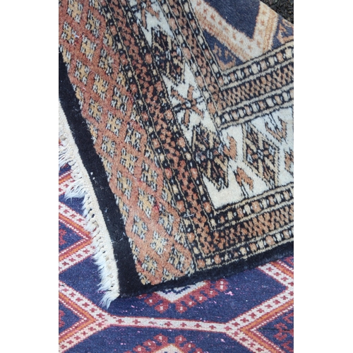 155 - THREE EASTERN RUGS 
125 X 79CM