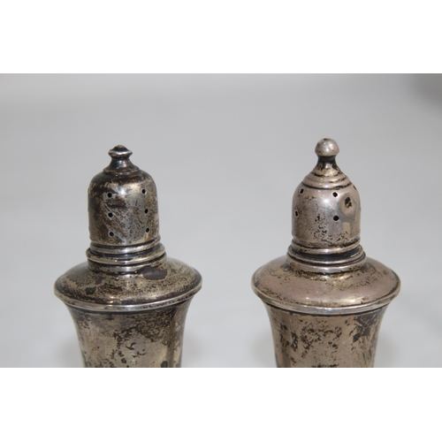 887 - PAIR OF LARGE STERLING SILVER SALT AND PEPPER POTS WITH WEIGHTED BASES AND LINERS, 169 GRAMS OVERALL