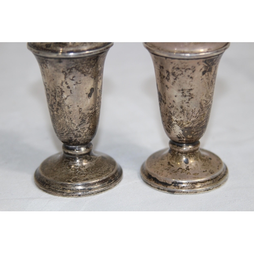 887 - PAIR OF LARGE STERLING SILVER SALT AND PEPPER POTS WITH WEIGHTED BASES AND LINERS, 169 GRAMS OVERALL