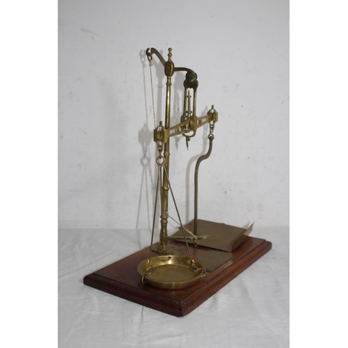 319 - VINTAGE LETTER SCALES 
43 X 30CM