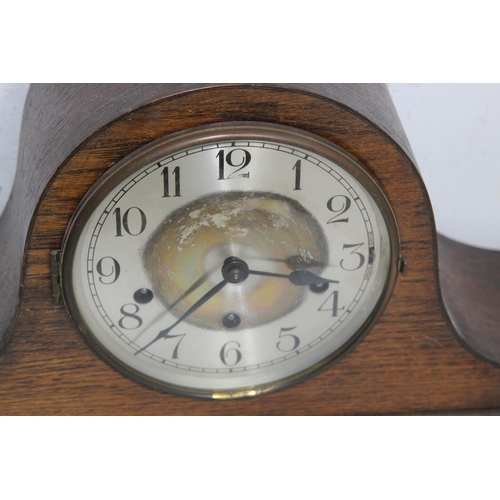 323 - FOUR VINTAGE CLOCKS 
28 X 24 X 12CM