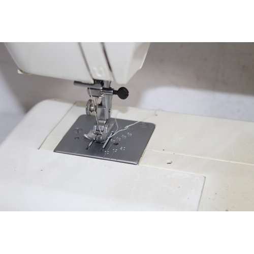 288 - VINTAGE JANOME MODEL JF 1004 SEWING MACHINE