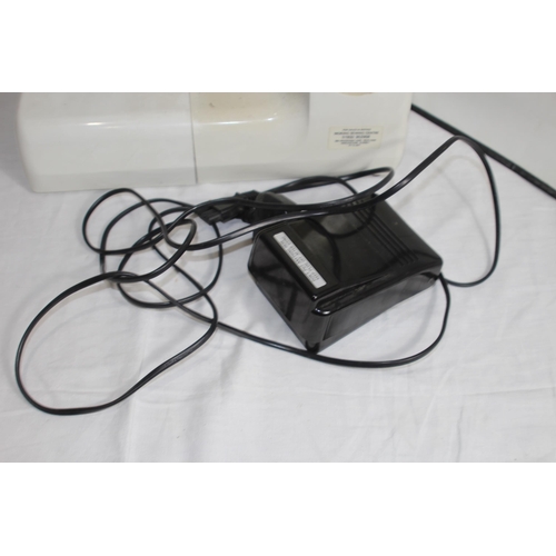 288 - VINTAGE JANOME MODEL JF 1004 SEWING MACHINE