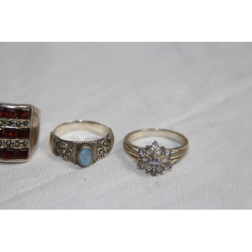 855 - QUANTITY OF SILVER RINGS - 66G