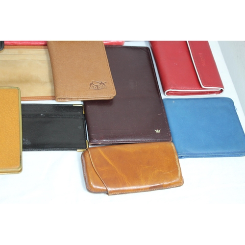 328 - LARGE QUANTITY OF LEATHER PURSES ETC