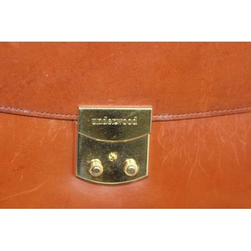 328 - LARGE QUANTITY OF LEATHER PURSES ETC