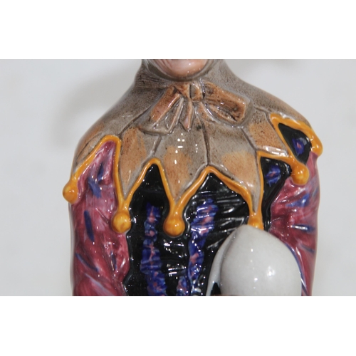 667 - ROYAL DOULTON THE JESTER FIGURINE
24CM