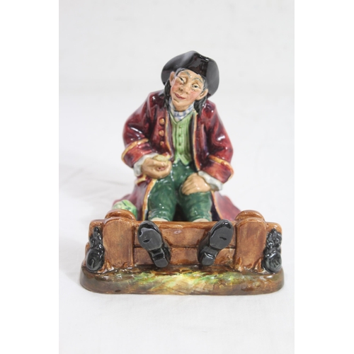 676 - ROYAL DOULTON IN THE STOCKS FIGURINE
14 X 14CM