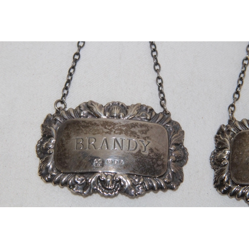 902 - THREE HALLMARKED SILVER DECANTER LABELS - 41.5G - LONDON 1977 + 1978 - ALAN WEISROSE