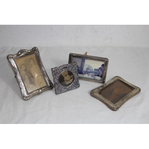 905 - COLLECTION OF 4 SILVER PICTURE FRAMES 
18 X 13CM