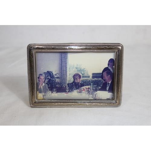 905 - COLLECTION OF 4 SILVER PICTURE FRAMES 
18 X 13CM
