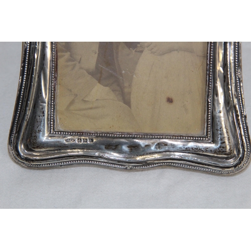 905 - COLLECTION OF 4 SILVER PICTURE FRAMES 
18 X 13CM