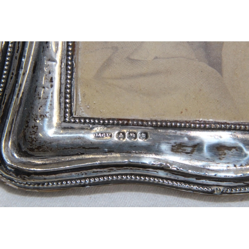 905 - COLLECTION OF 4 SILVER PICTURE FRAMES 
18 X 13CM