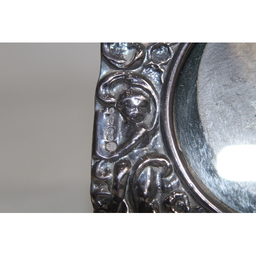 905 - COLLECTION OF 4 SILVER PICTURE FRAMES 
18 X 13CM