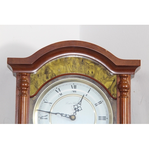 394 - LONDON CLOCK CO WESTMINSTER WALL CLOCK
60 X 30CM