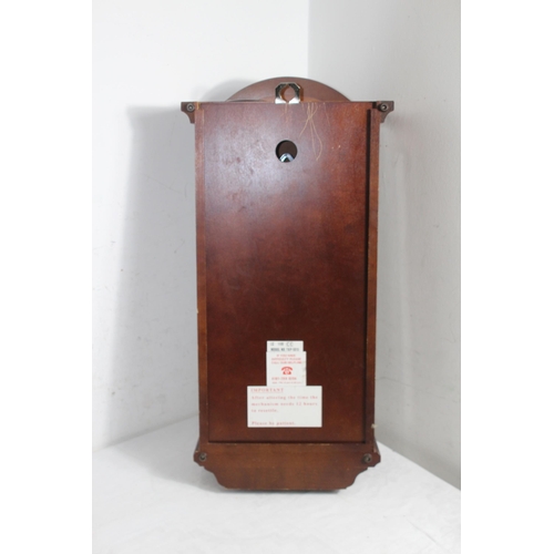 394 - LONDON CLOCK CO WESTMINSTER WALL CLOCK
60 X 30CM