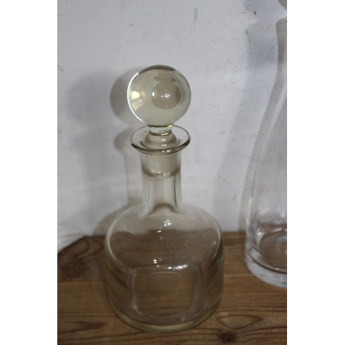 233 - SELECTION OF 7 VARIED DESIGN DECANTERS TO INCLUDE A SPOUTED CLARET DECANTER