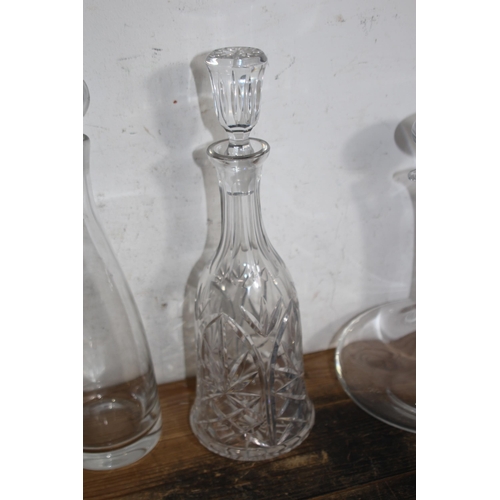 233 - SELECTION OF 7 VARIED DESIGN DECANTERS TO INCLUDE A SPOUTED CLARET DECANTER