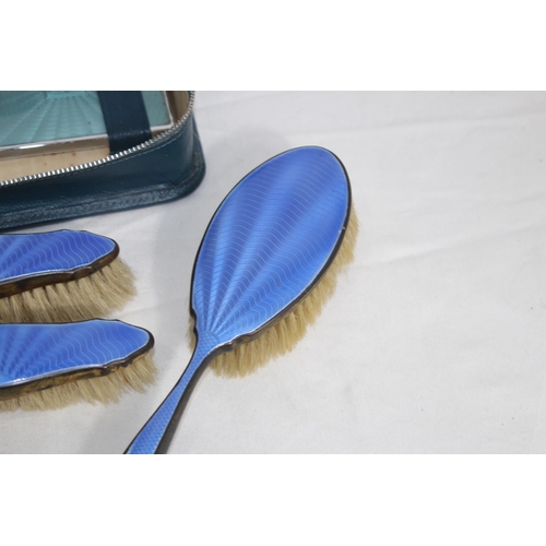 420 - GUILLOCHE ENAMEL DRESSING TABLE SET AND A CASED FAUX ENAMEL SET