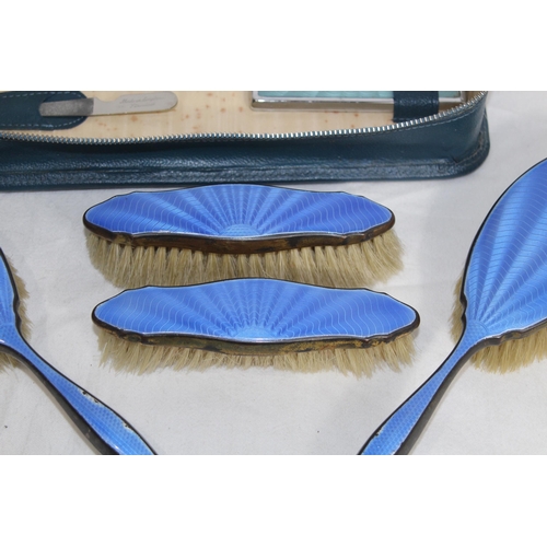 420 - GUILLOCHE ENAMEL DRESSING TABLE SET AND A CASED FAUX ENAMEL SET