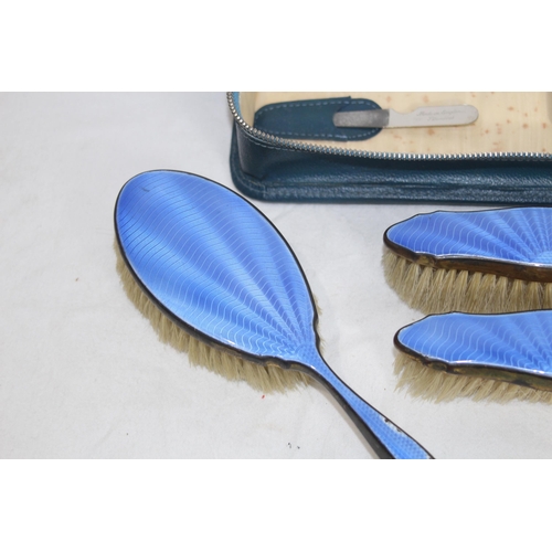 420 - GUILLOCHE ENAMEL DRESSING TABLE SET AND A CASED FAUX ENAMEL SET