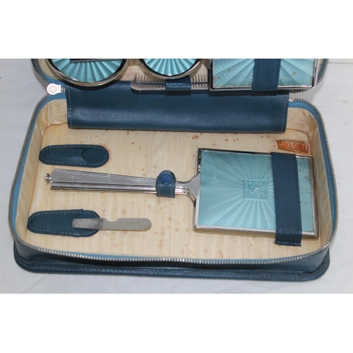 420 - GUILLOCHE ENAMEL DRESSING TABLE SET AND A CASED FAUX ENAMEL SET