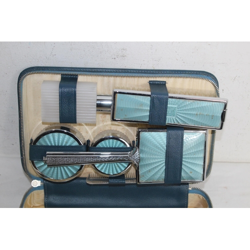 420 - GUILLOCHE ENAMEL DRESSING TABLE SET AND A CASED FAUX ENAMEL SET