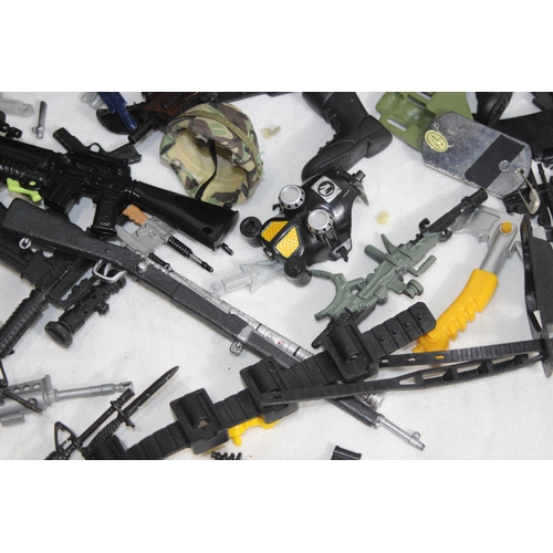 539 - VINTAGE ACTION MAN FOOT LOCKER WITH LARGE QUANTITY OF ACTION MAN WEAPONS & ACCESSORIES