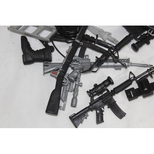 539 - VINTAGE ACTION MAN FOOT LOCKER WITH LARGE QUANTITY OF ACTION MAN WEAPONS & ACCESSORIES