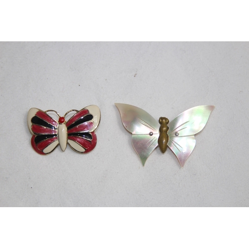 767 - TWO BUTTERFLY BROOCHES ONE ENAMEL ONE WITH MOTHER OF PEARL WINGS