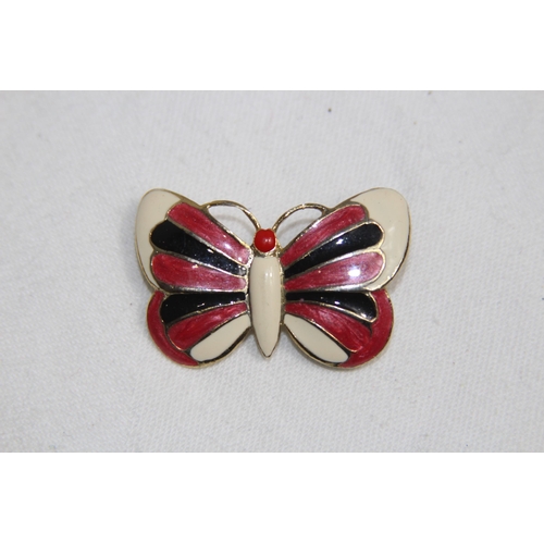 767 - TWO BUTTERFLY BROOCHES ONE ENAMEL ONE WITH MOTHER OF PEARL WINGS