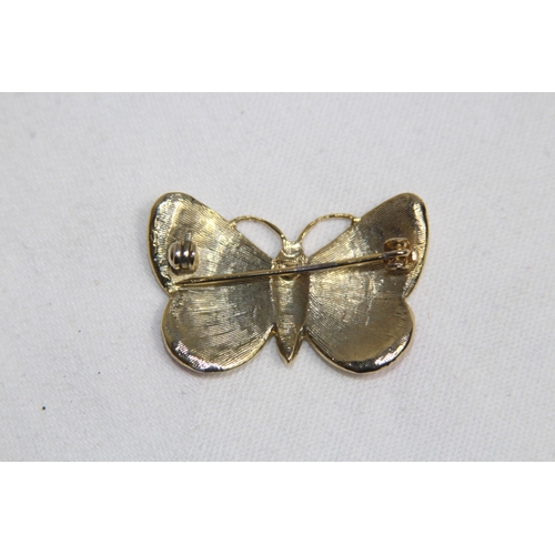 767 - TWO BUTTERFLY BROOCHES ONE ENAMEL ONE WITH MOTHER OF PEARL WINGS