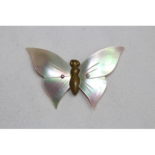 767 - TWO BUTTERFLY BROOCHES ONE ENAMEL ONE WITH MOTHER OF PEARL WINGS