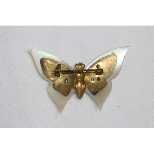 767 - TWO BUTTERFLY BROOCHES ONE ENAMEL ONE WITH MOTHER OF PEARL WINGS