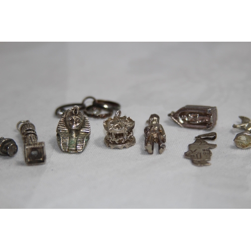 865 - SELECTION OF SILVER CHARMS FOR CHARM BRACELET, 35.7 GRAMS