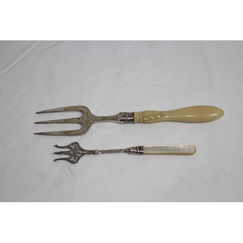 932 - SILVER PRONGED TOASTING FORK AND A SILVER FERRULED TOASTING FORK