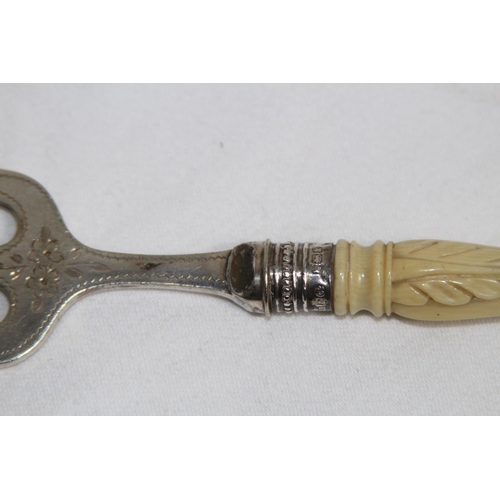 932 - SILVER PRONGED TOASTING FORK AND A SILVER FERRULED TOASTING FORK