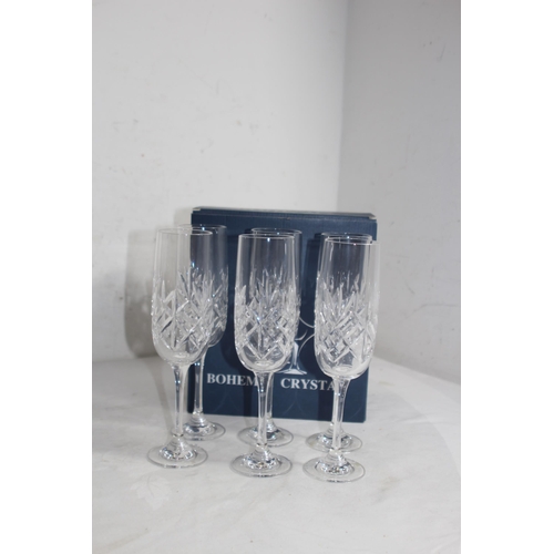 704 - BOXED SET OF SIX BOHEMIA CRYSTAL CHAMPAGNE GLASSES