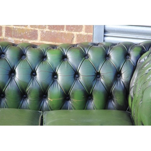 24 - GREEN LEATHER THREE SEATER CHESTERFIELD SOFA 
190 X 81 X 70CM