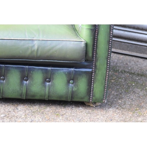 24 - GREEN LEATHER THREE SEATER CHESTERFIELD SOFA 
190 X 81 X 70CM