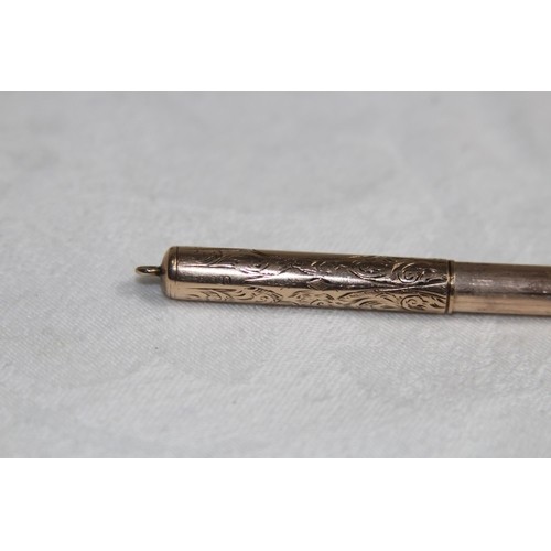 987 - 9CT GOLD PENCIL, 11.86 GRAMS