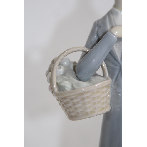 712 - NAO FIGURINE OF WOMEN WITH FLOWERS AND UMBRELLA 
37CM