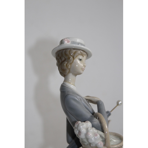 712 - NAO FIGURINE OF WOMEN WITH FLOWERS AND UMBRELLA 
37CM