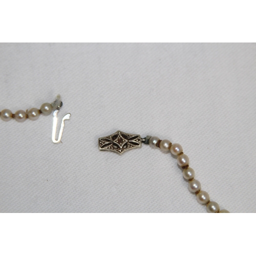 828 - SILVER CLASP PEARL NECKLACE