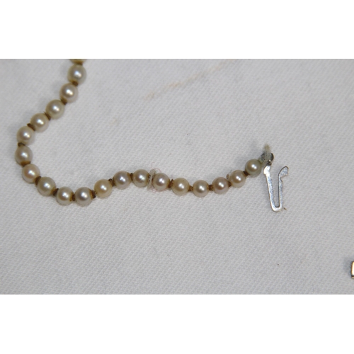 828 - SILVER CLASP PEARL NECKLACE