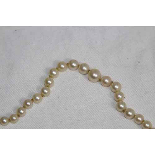 828 - SILVER CLASP PEARL NECKLACE
