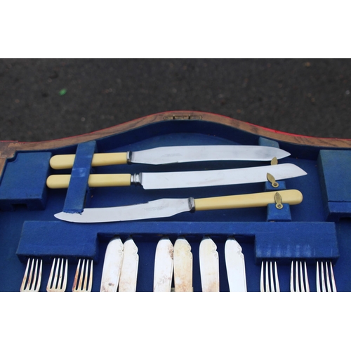 448 - VINTAGE CUTLERY SET ON LEGS